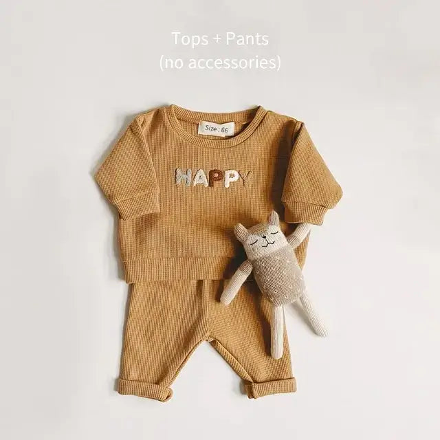 Baby Clothes Set – Stylish & Comfy Outfit for Babies Adorable baby set with soft fabric, casual top, and loose trousers for all-day comfort and style. $35.73 Kind Nest