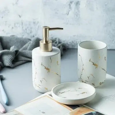 Nordic Matte Bathroom Accessories Set Elevate your bathroom into a sanctuary of opulence with our Nordic Matte Gold Ceramics Bathroom Accessories Set. Imbued with a touch of Scandinavian charm, this exquisite ensemble exudes sophistication while seamlessl